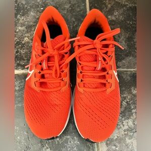 Women’s size 8.5 Nike Pegasus 38. 
Orange in color-great condition.